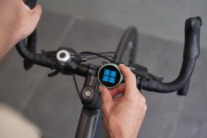 Tikpal Voice mounted on a bike handlebar — capture thoughts on the ride